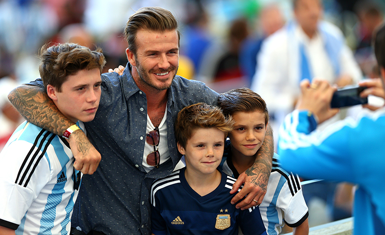 David Beckham con sus tres chicos: Brooklyn, Romeo y Cruz. © Getty Images