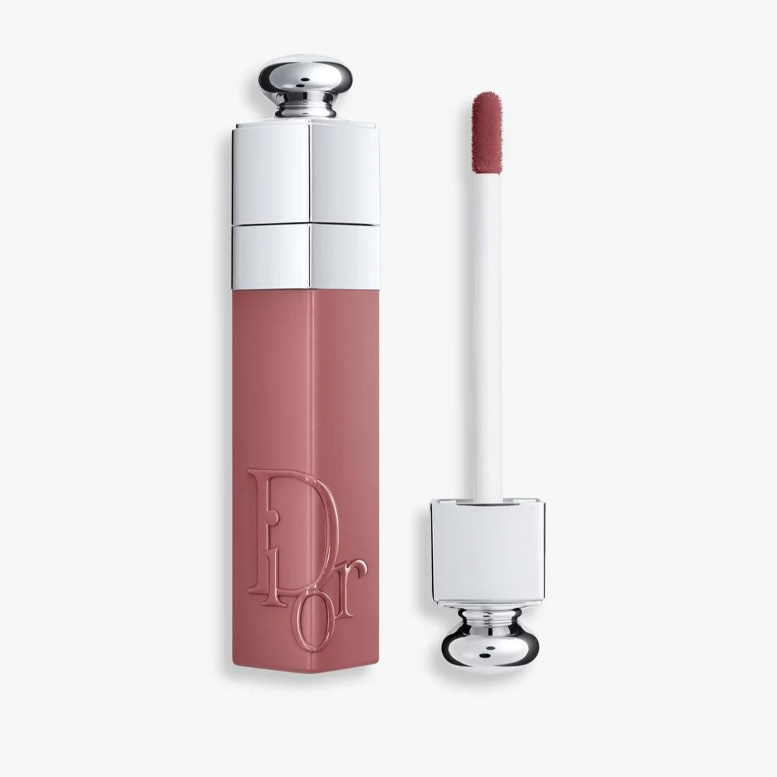 Lipstick in a deep pink shade on a white background. The lipstick can be used to create a soft goth look.