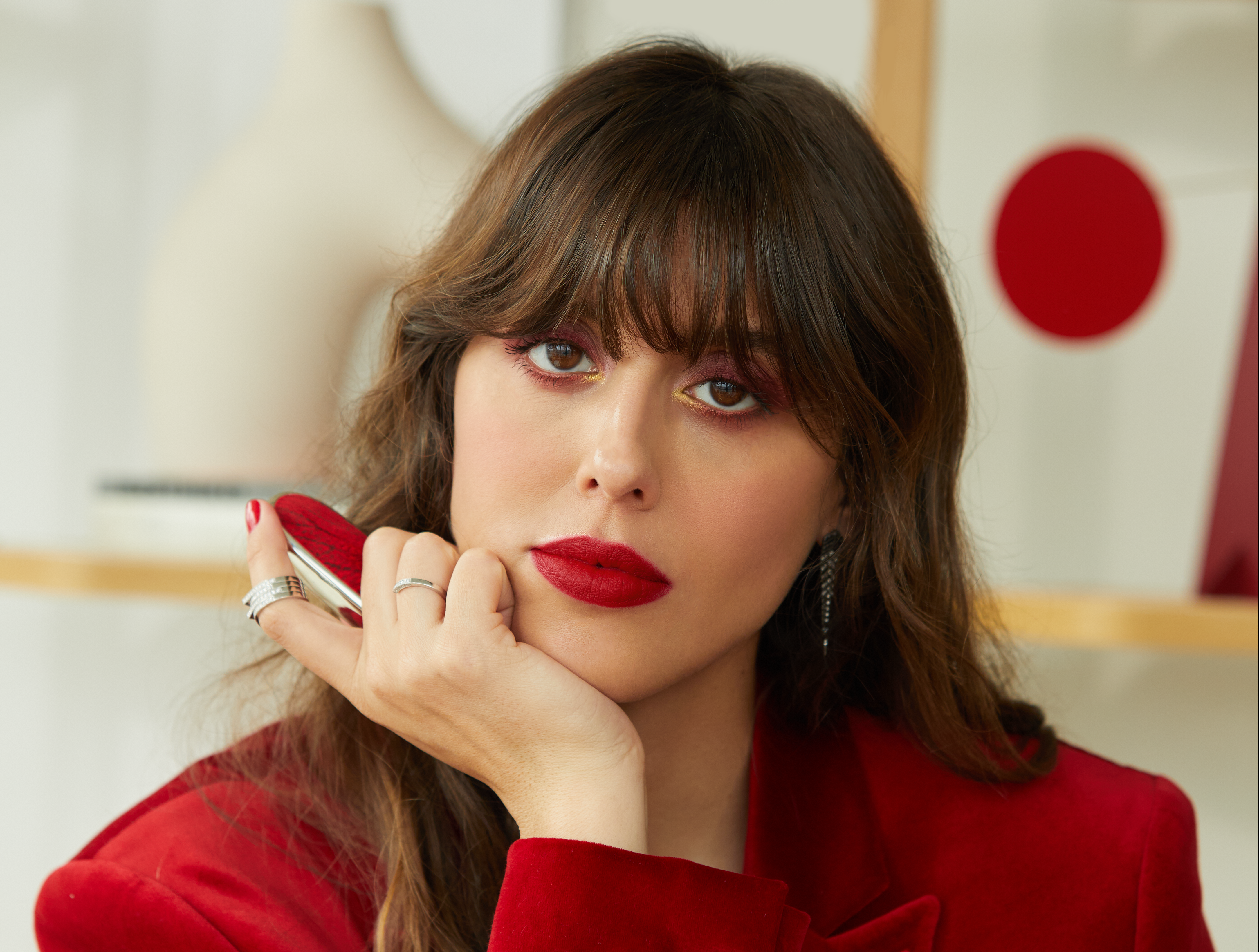 January Beauty – A model wears Guerlain's new The Red Orchid Jewel Lipstick