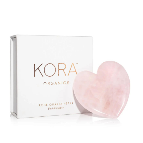 beauty Valentine’s gifts: KORA Organics heart-shaped, pink Rose Quartz Facial Sculptor on white background.