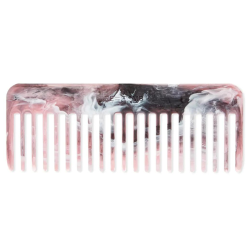 A RE:COMB comb on a white background