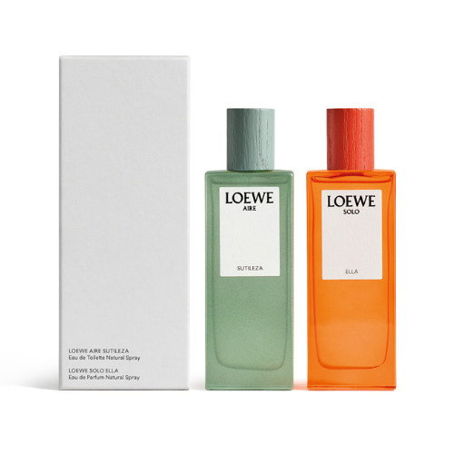 Packshot of Loewe's Duo Set; one green perfume bottle and one orange bottle sit against a white background