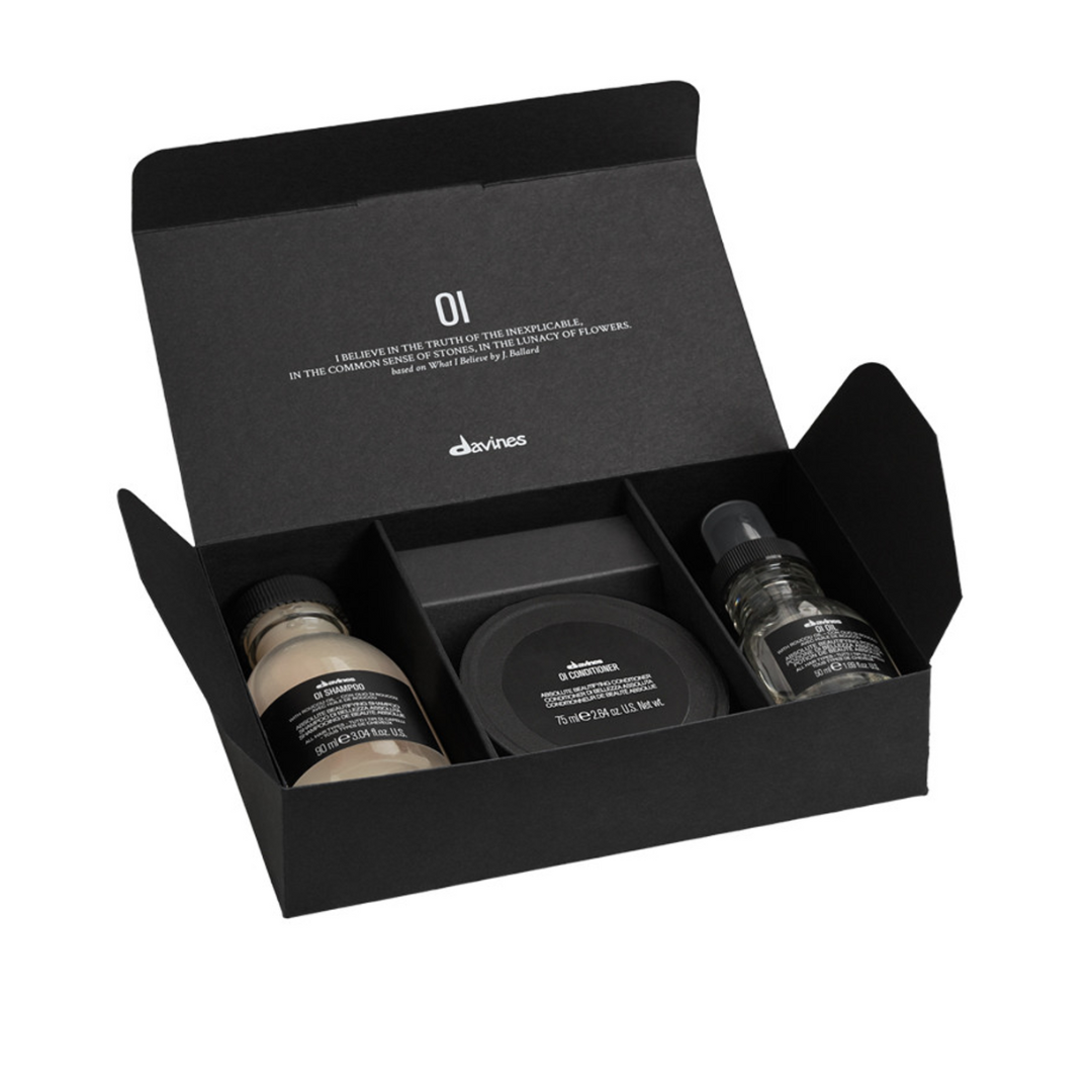 Beauty travel kits: a trio of mini Davines hair essentials, including a shampoo, conditioner and hair oil.