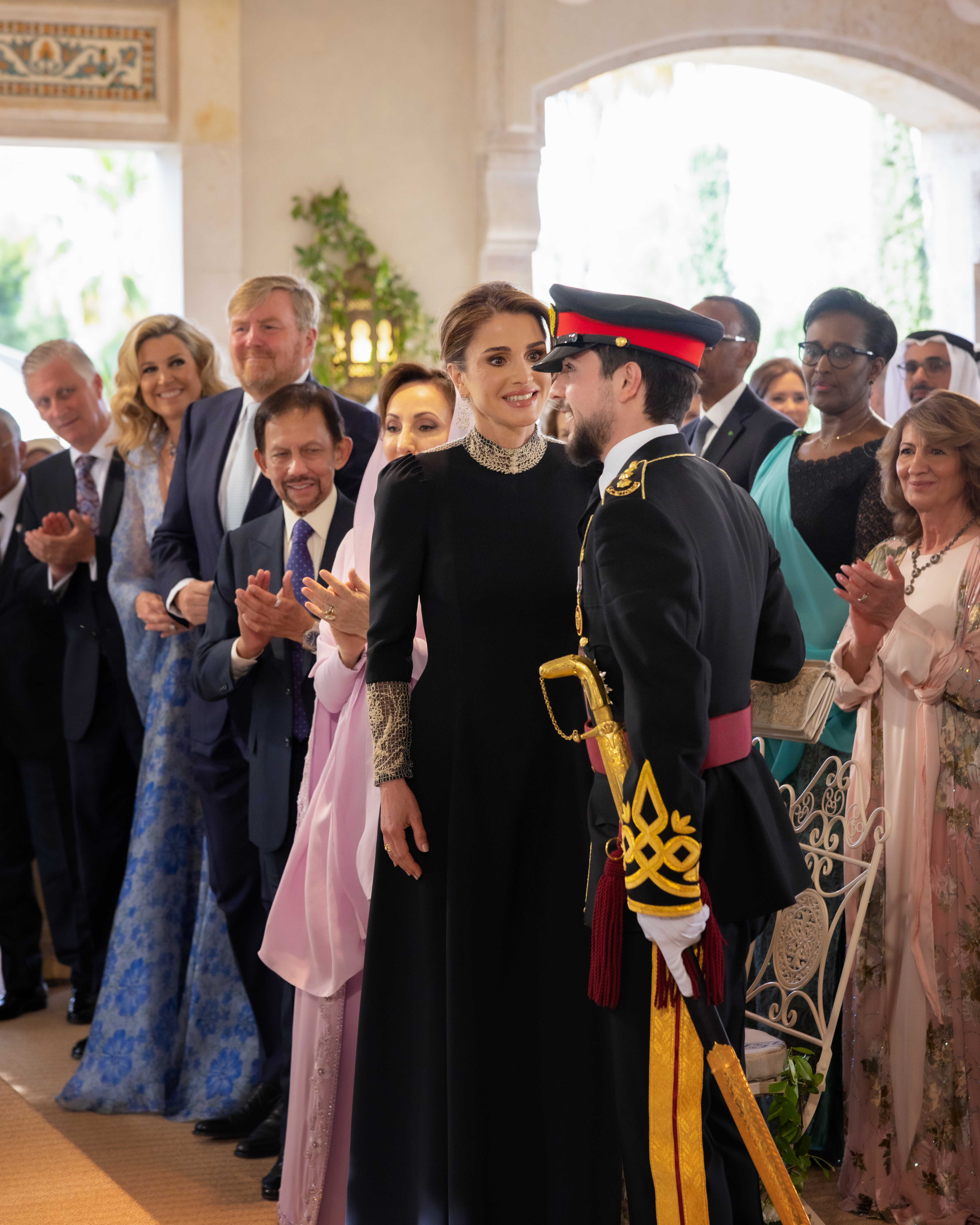 Queen Rania attending HRH the Crown Prince Hussein of Jordan and Rajwa Alseif's wedding