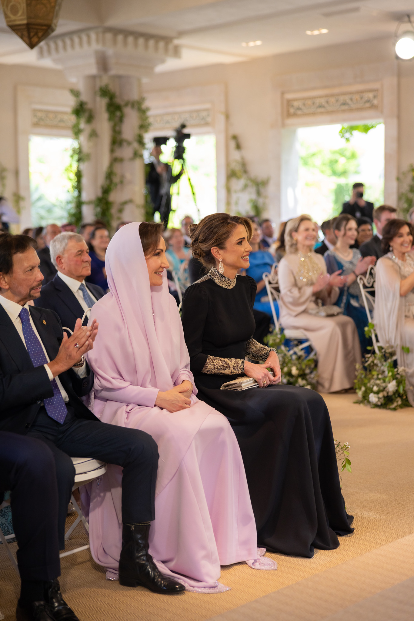 Queen Rania attending HRH the Crown Prince Hussein of Jordan and Rajwa Alseif's wedding