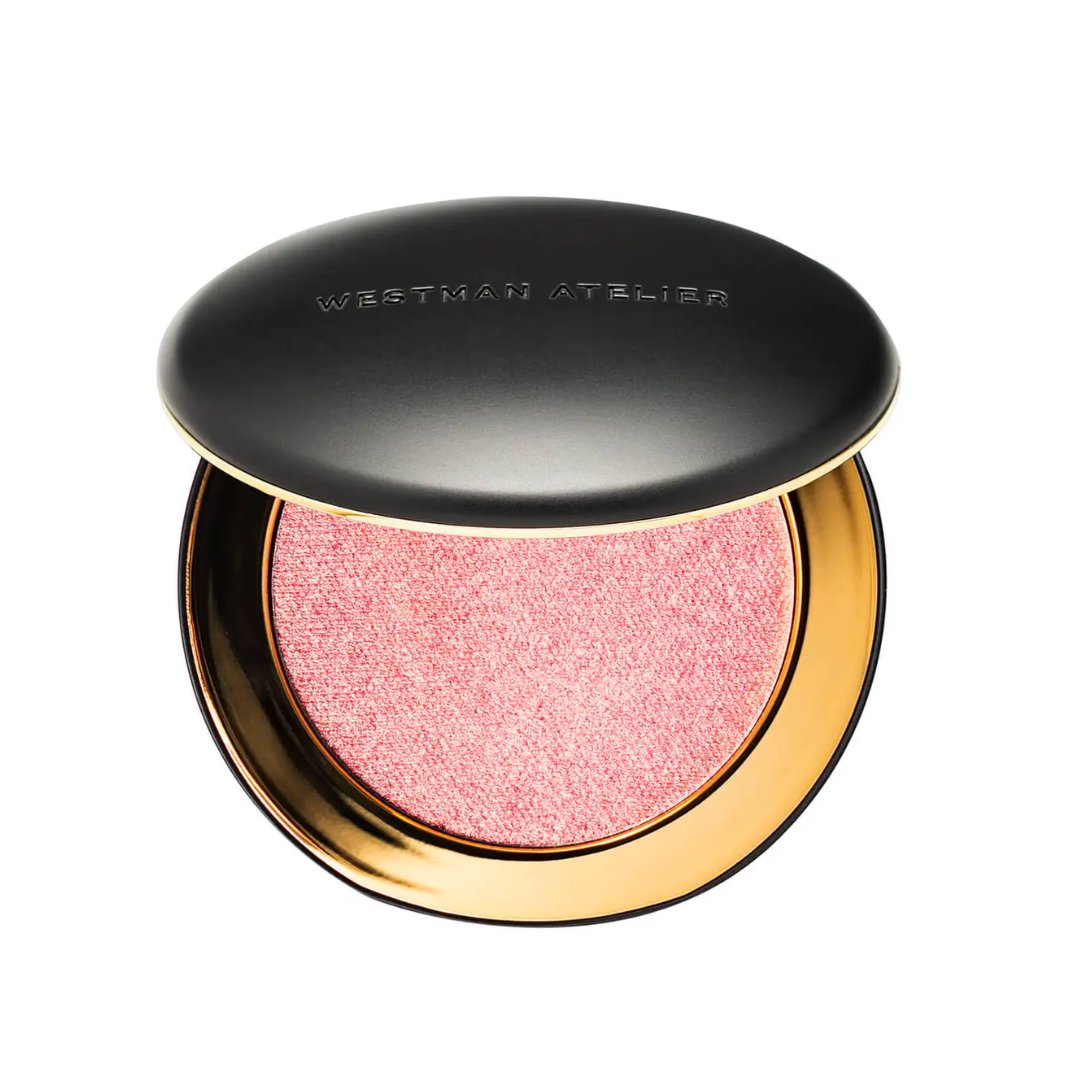 Westman Atelier Super Loaded Tinted Highlight is shown on a white background. Use this for a glowy makeup look.