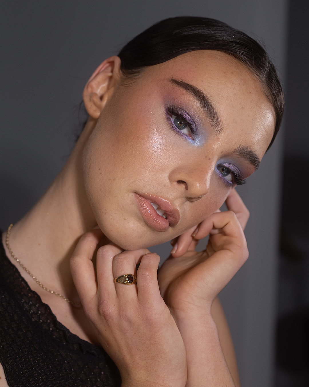 Glowy makeup and glowy skin shown on a model, with makeup done by Jonathon Thorpe.