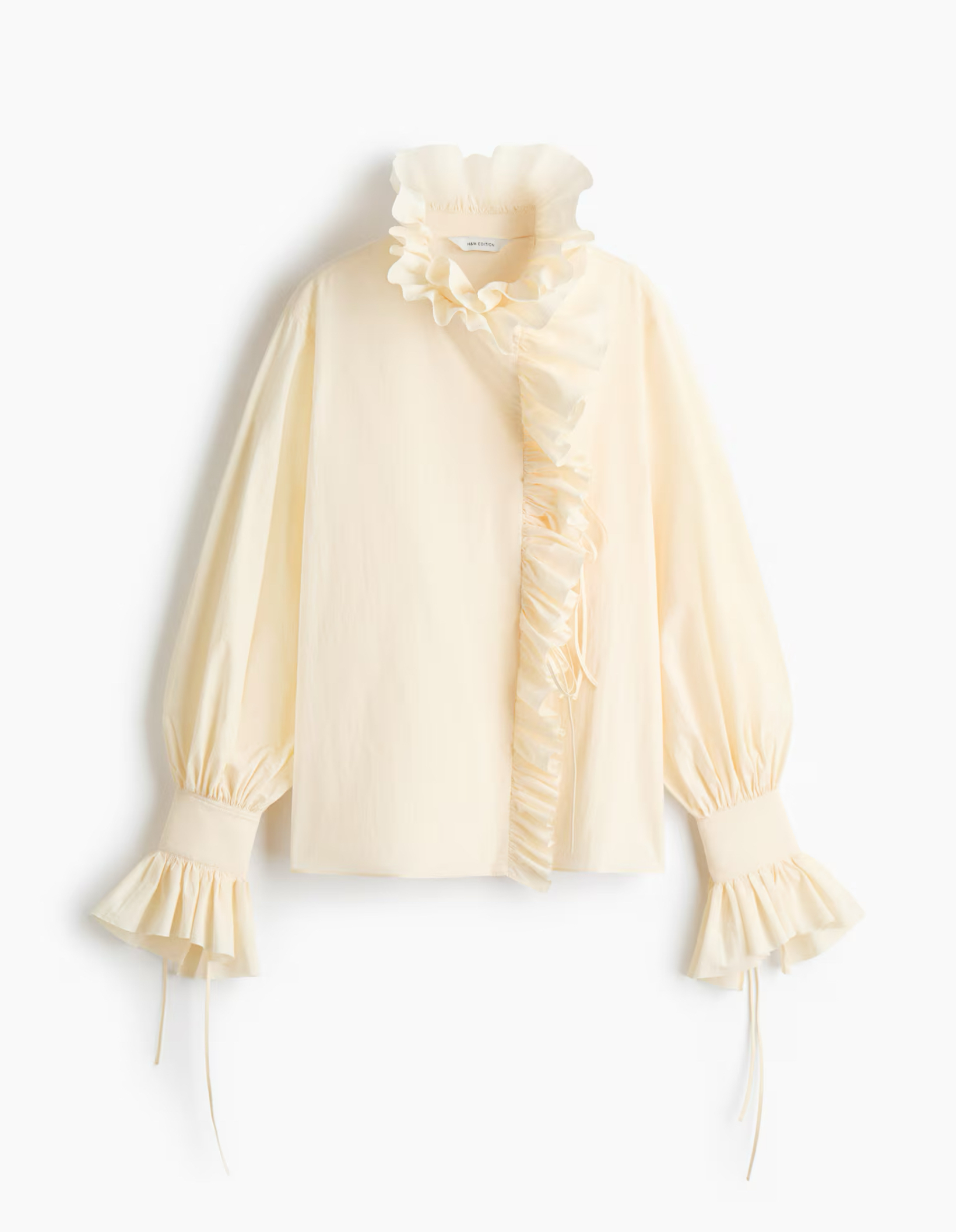 Blusa con olanes color crema
