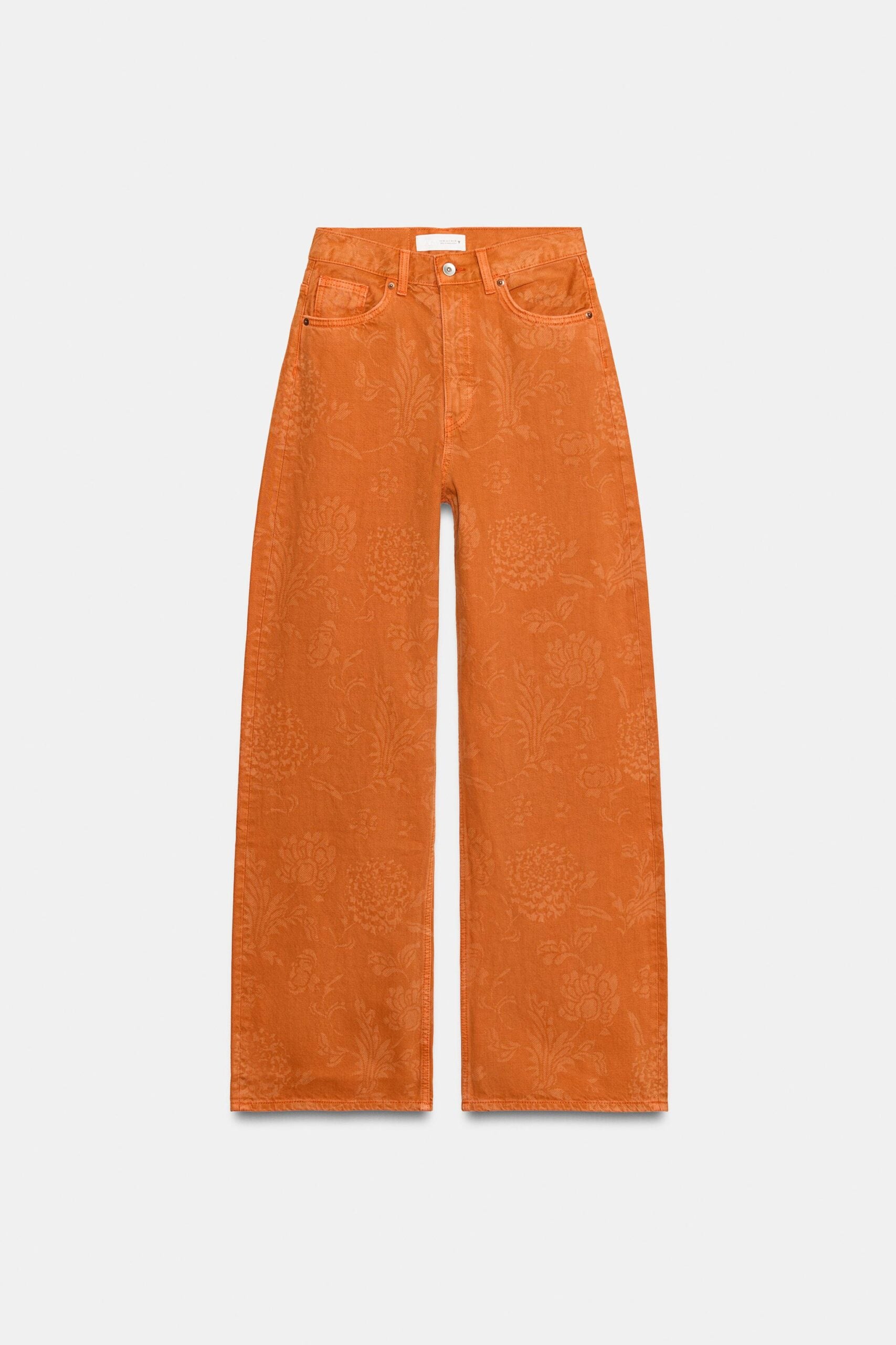 Jeans naranjas con motivos florales colección ZARA día de muertos