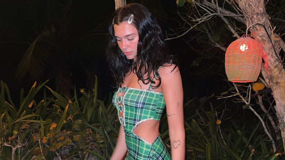 Dua Lipa's Holiday Attire Includes An Exposed Fenty G-String As