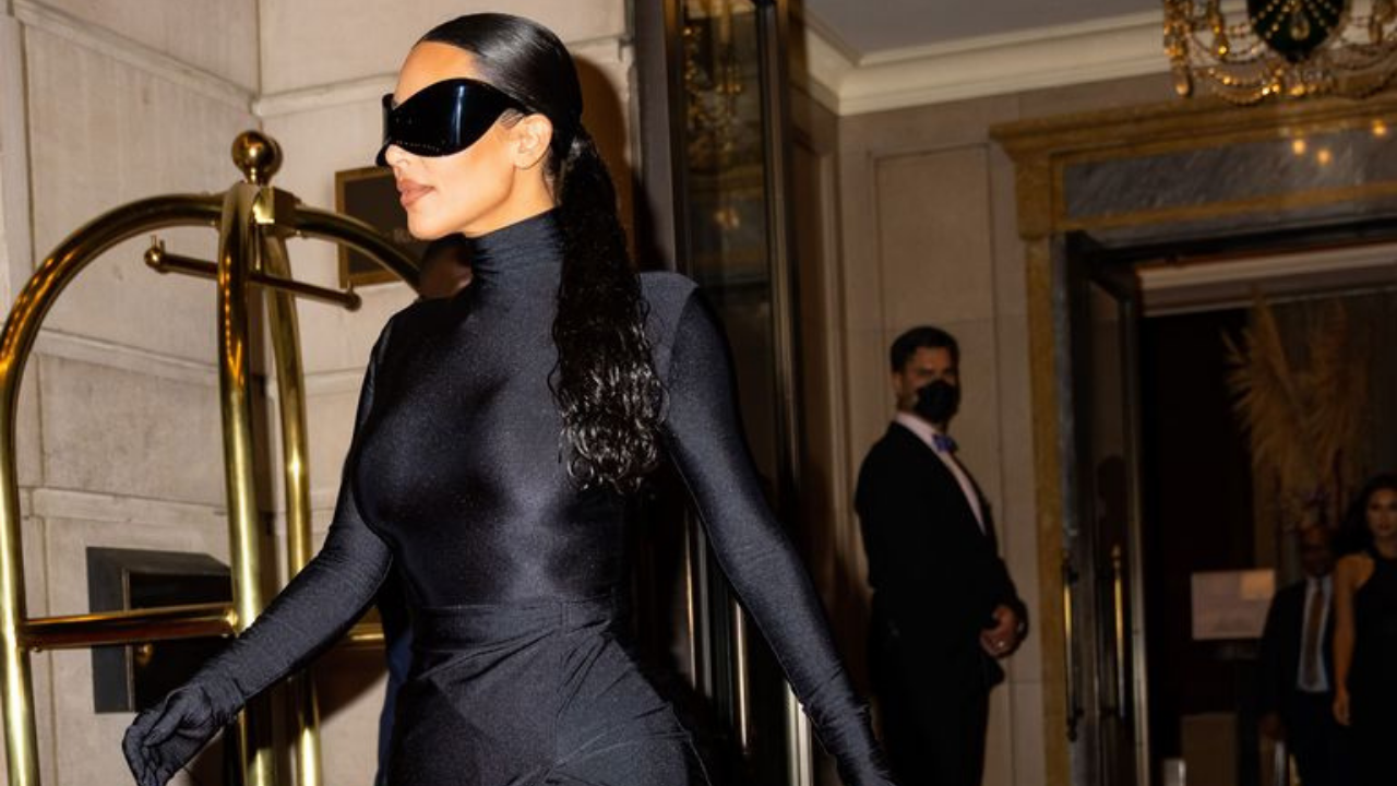 Kim Kardashian Elevates an Unexpected Maxi Dress With Gold Balenciaga  Choker  Pointy Boots