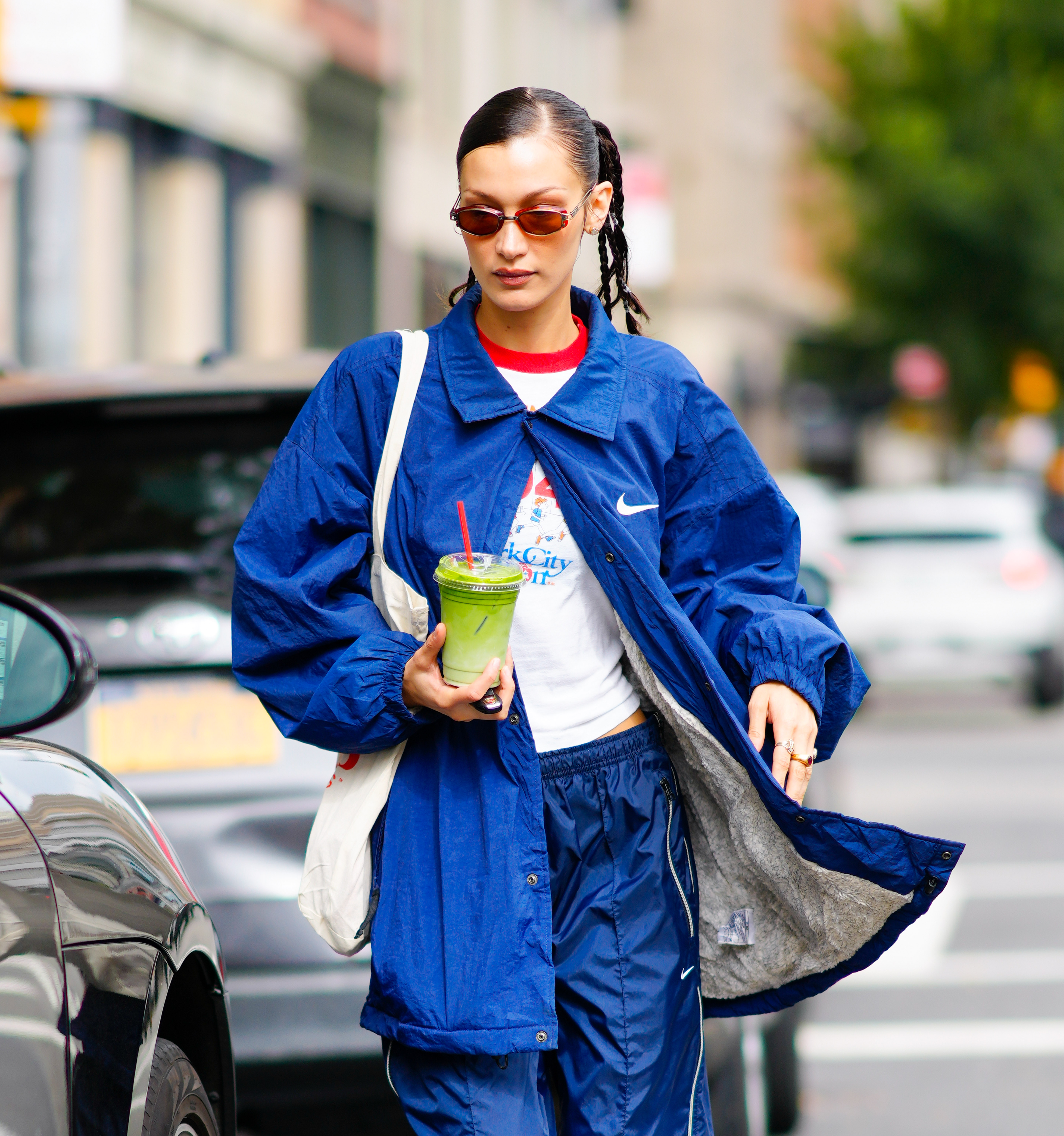 Bella Hadid Does Oversized Streetwear in Nike Jacket and Track Pants With  Go-to Asics Sneakers