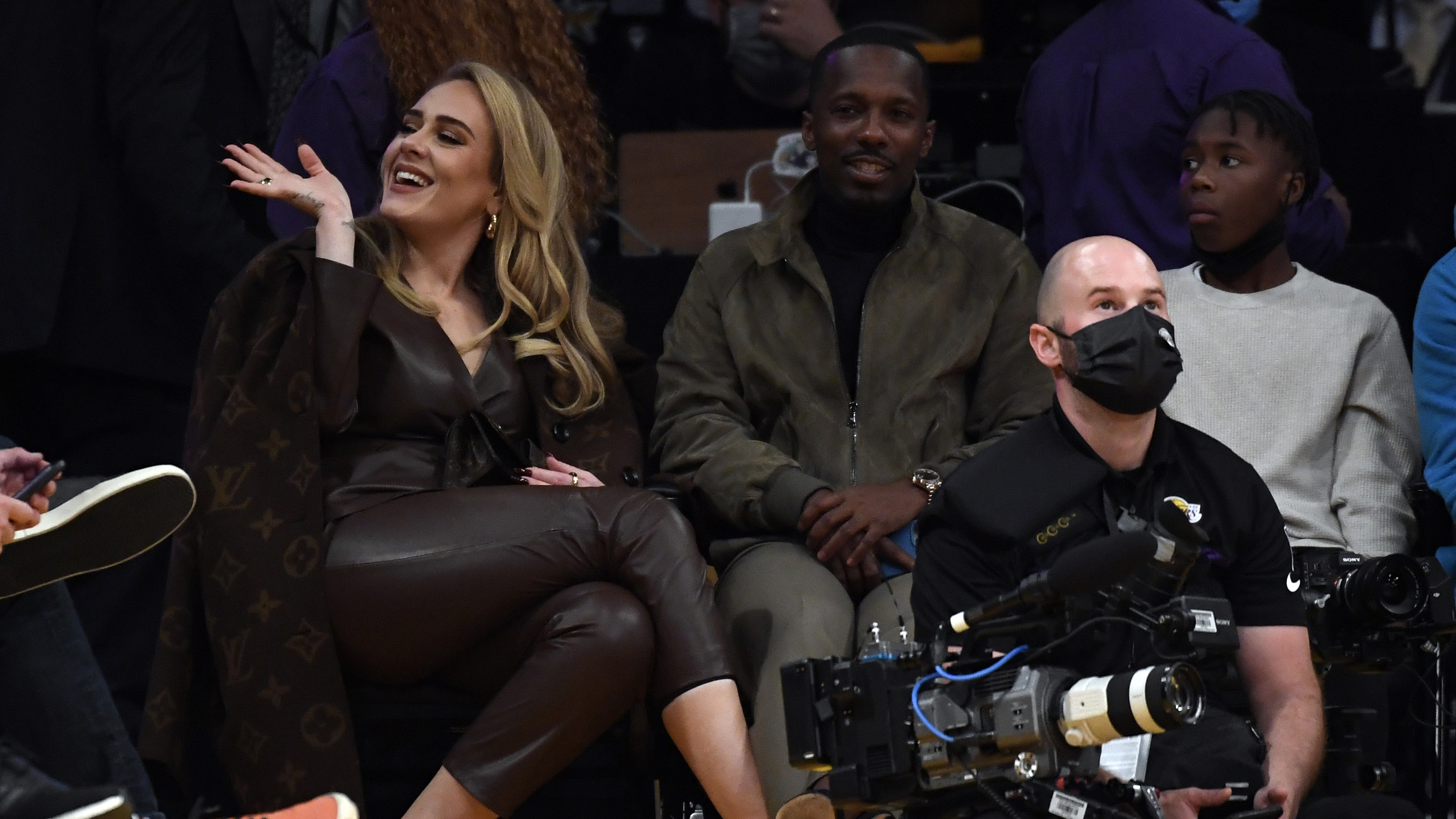 Adele Attends Lakers and Warriors Game Wearing Louis Vuitton Brown Monogram  Wool Coat and Pumps – Fashion Bomb Daily