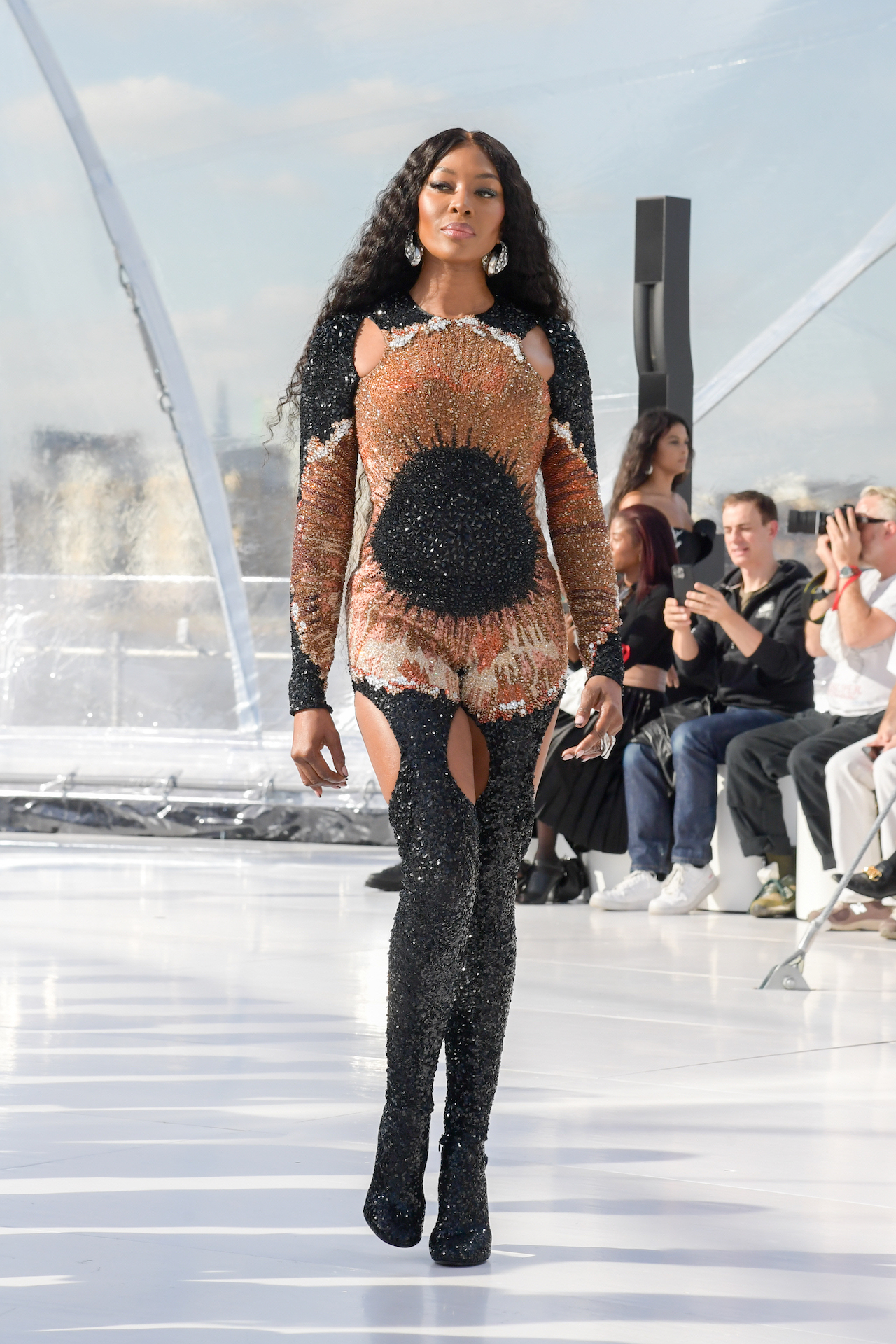 Model Naomi Campbell presents a creation from the Louis Vuitton News  Photo - Getty Images