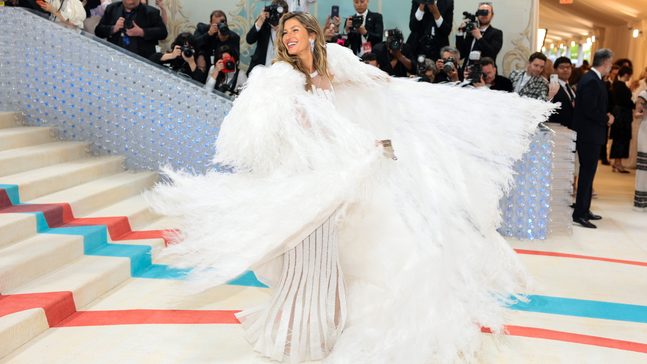 Gisele Bundchen Re-Wears White Chanel Dress on Met Gala Red Carpet –  Footwear News