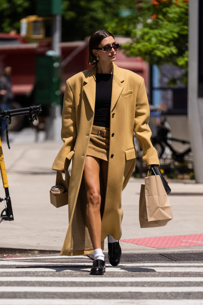 Hailey Bieber Wears Miniskirt and Loafers in NYC, Photos