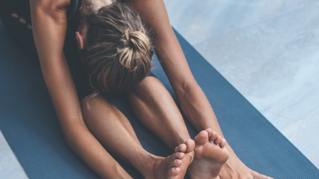 yoga-positions-woman-stretch