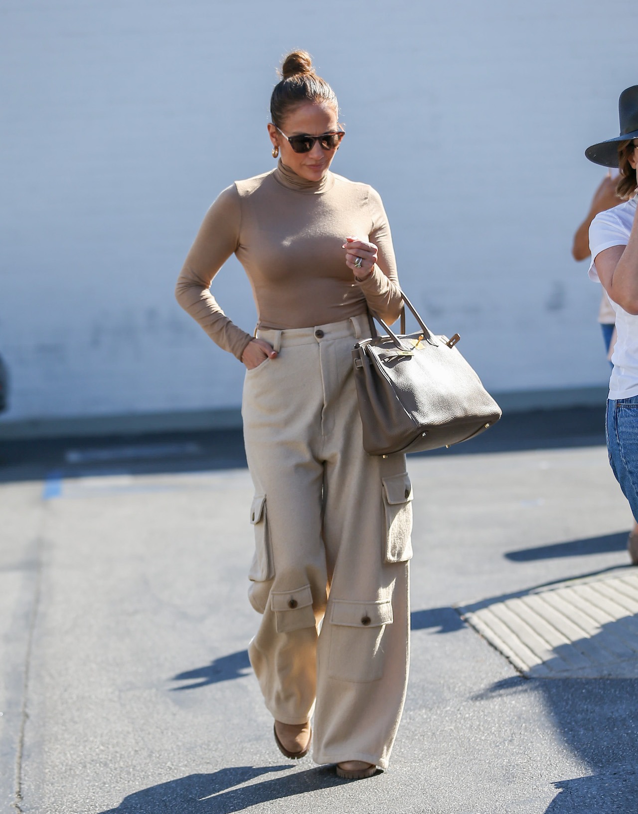 Jennifer Lopez Turns Heads in Grey Pants with Matching Thong