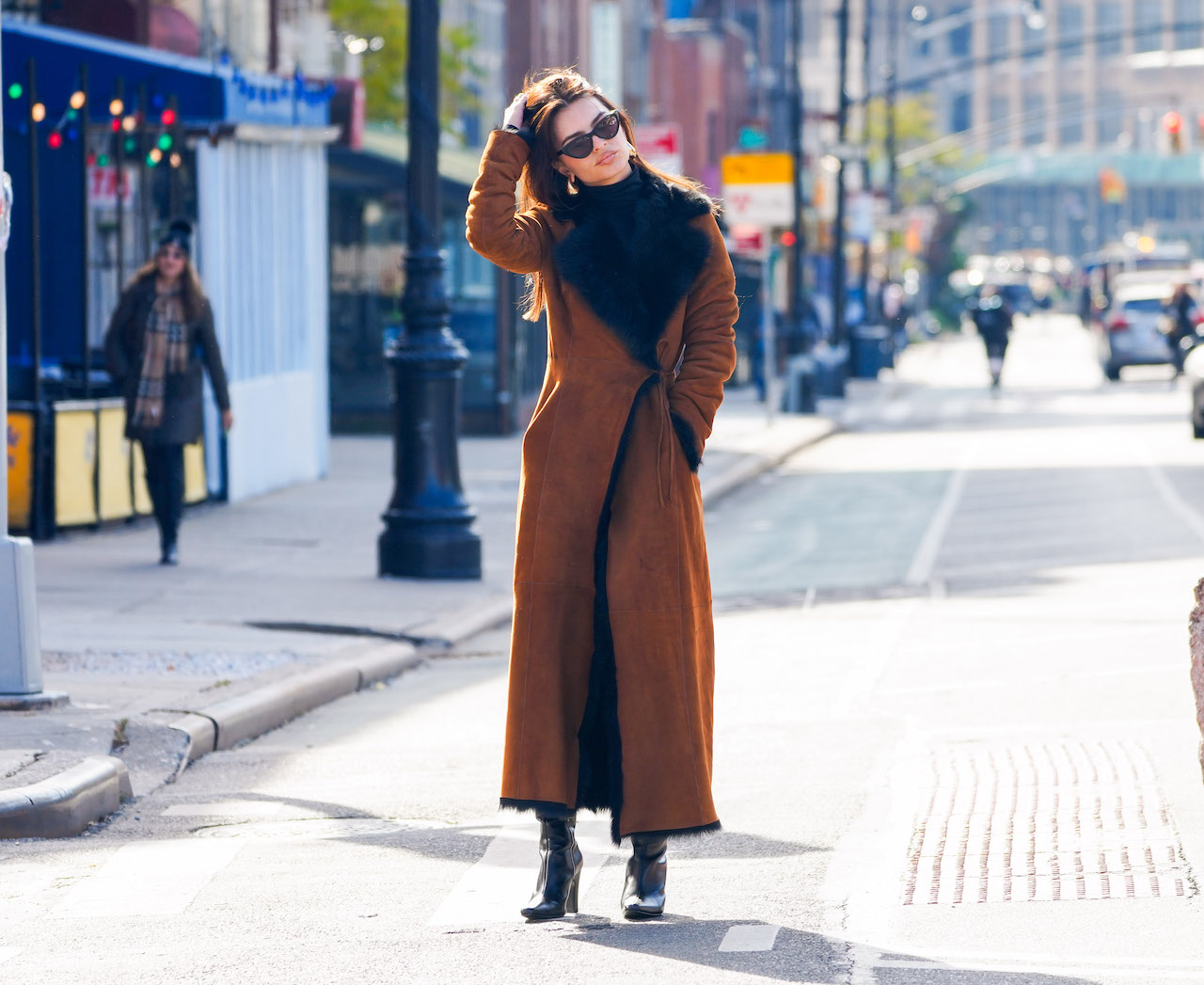 Transform Your All-Black Outfit with a Stunning Brown Coat