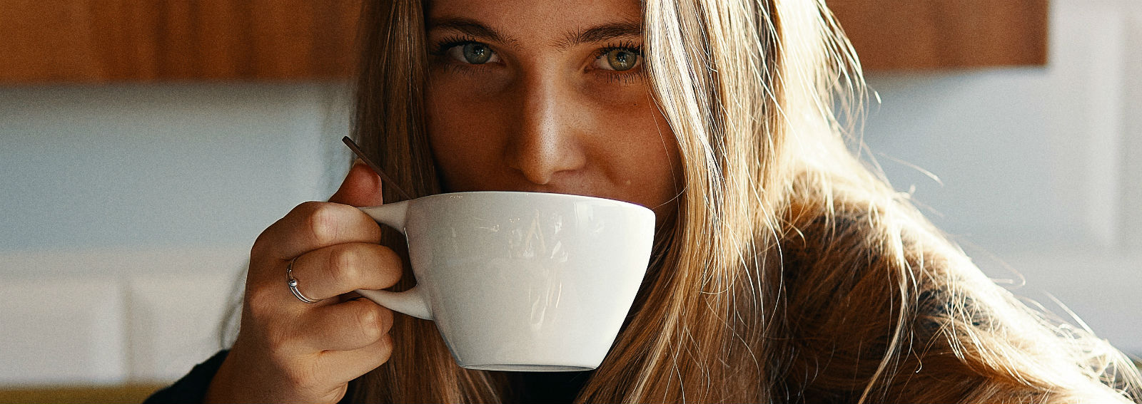 woman-tea-drinking-coffee-mug-white