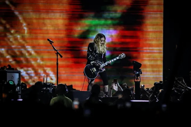 Madonna sued by fan for concert drama and 'unwarned pornography'
