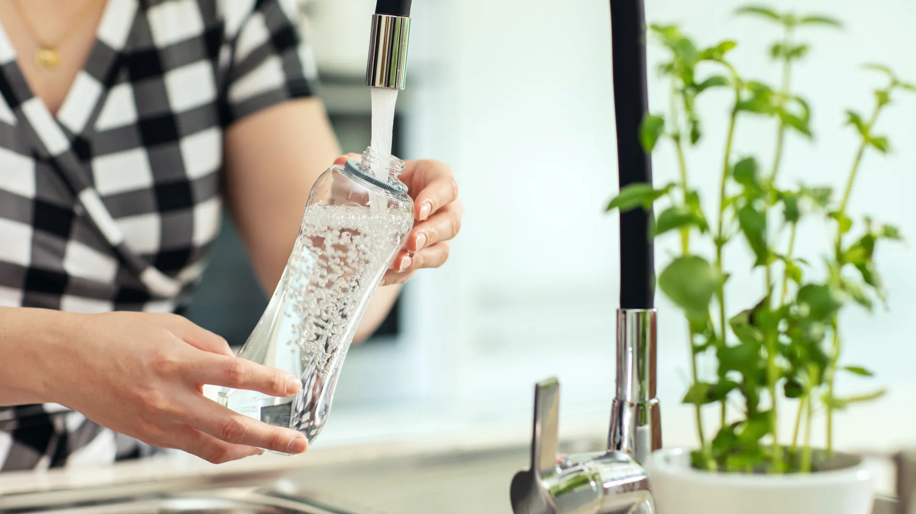 This very bad habit is causing bacteria on your water bottle.