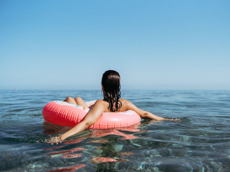 GettyImages-lady-floating-relaxing-horoscope-summer
