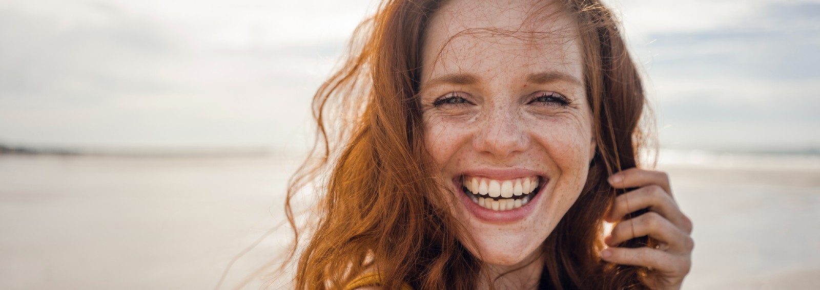 zodiac-sign-lady-laughing-happy-close-up