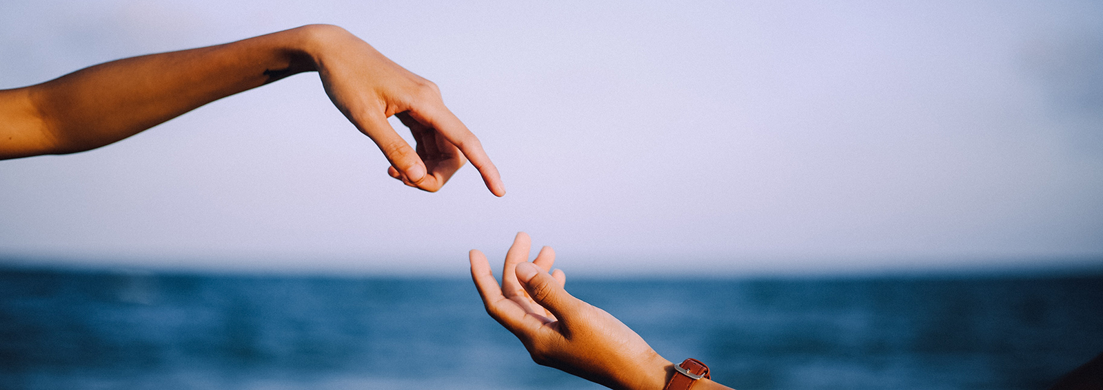 lovers-check-hands-beach-connection-fling