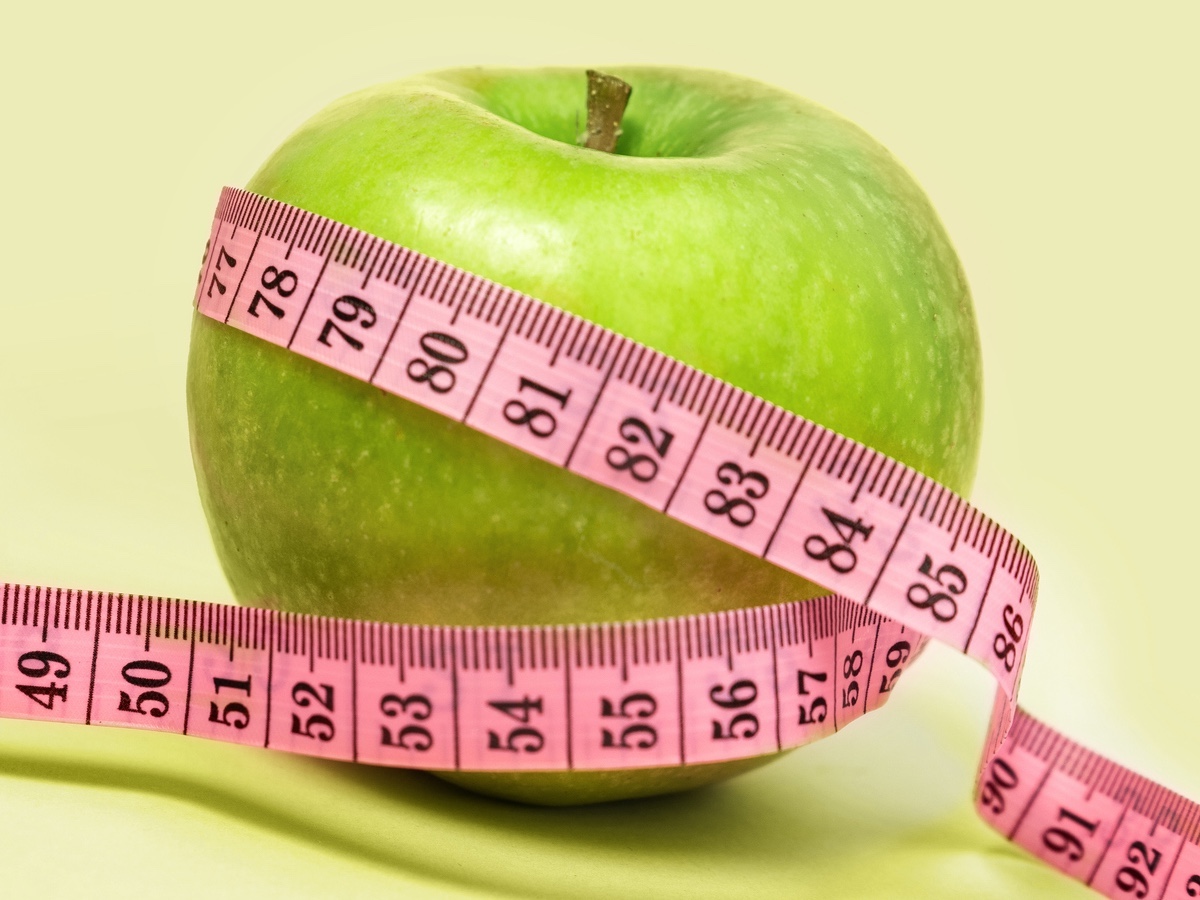 Getty-Images-apple-green-with-measuring-tape