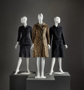 Carolyn Bessette-Kennedy’s Fashion: Auctioned Coats (L-R): Yohji Yamamoto, Vintage, Prada. Photo courtesy of Sotheby’s.