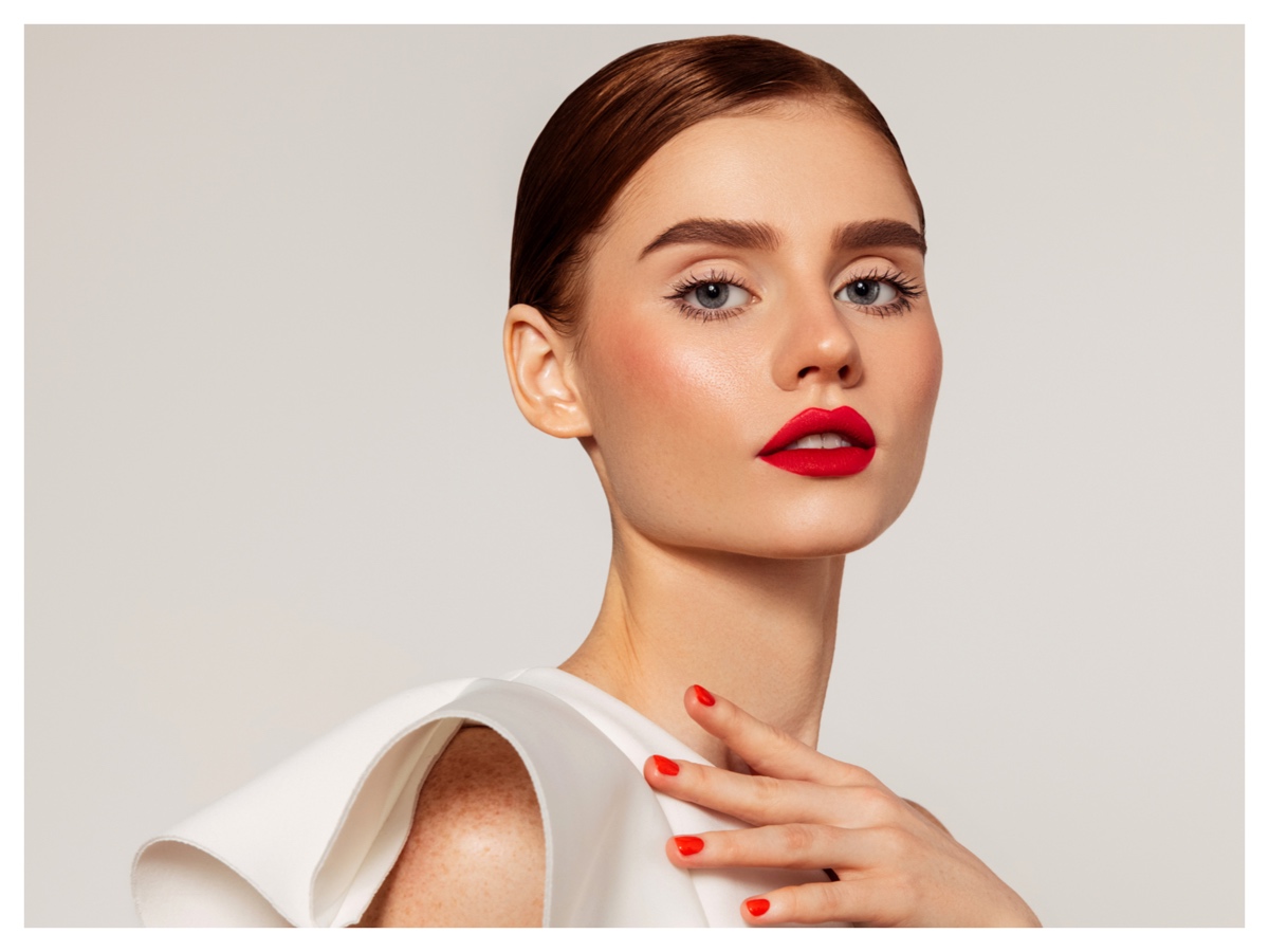 woman-in-a-white-dress-with-clean-eyebrow-make-up
