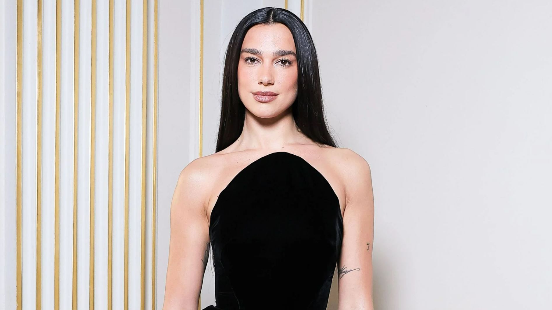 Dua Lipa Turns Heads in a Revealing Backless Gown