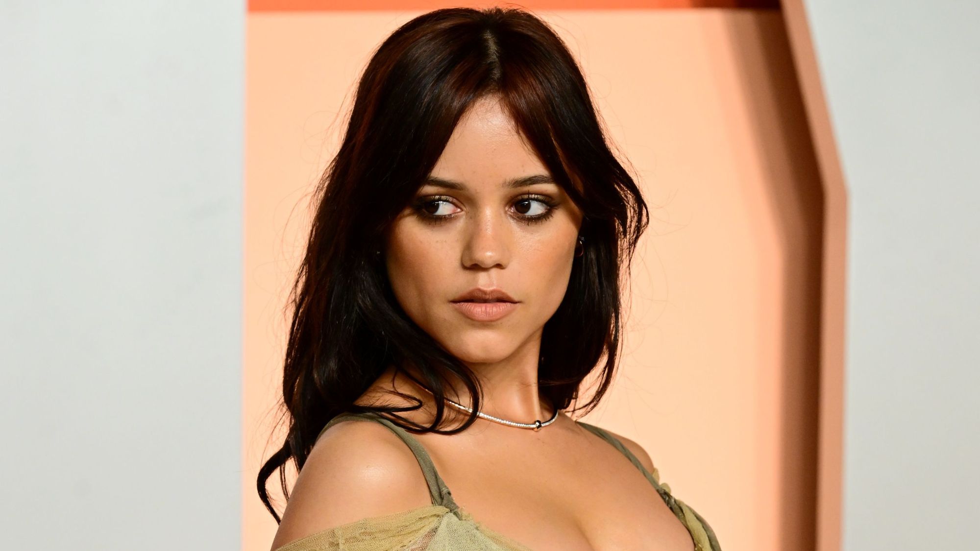 At the premiere of Death of a Unicorn, Jenna Ortega shone on the red carpet, wearing a fitted black dress with a high slit.