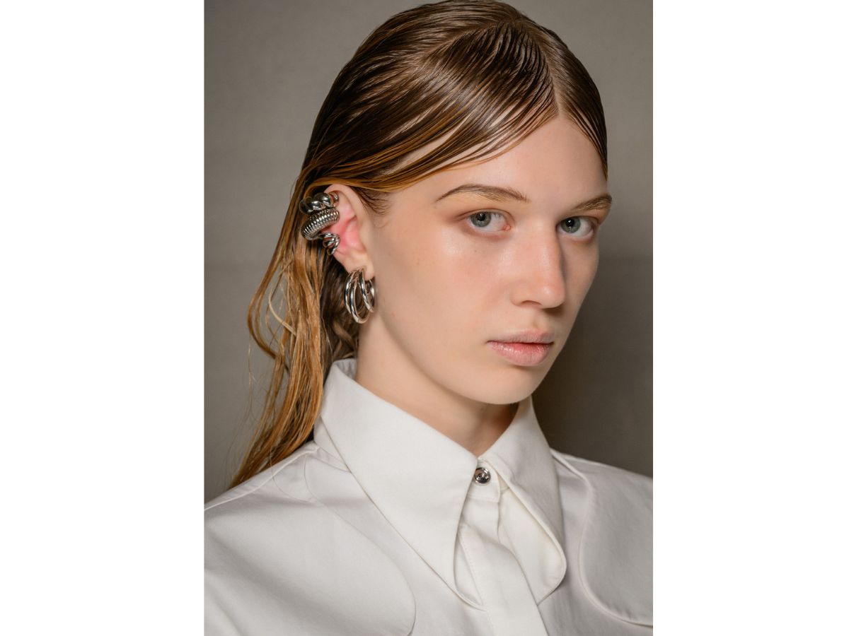 model-wearing-white-flat-hair-brown-and-blonde-with-side-bangs