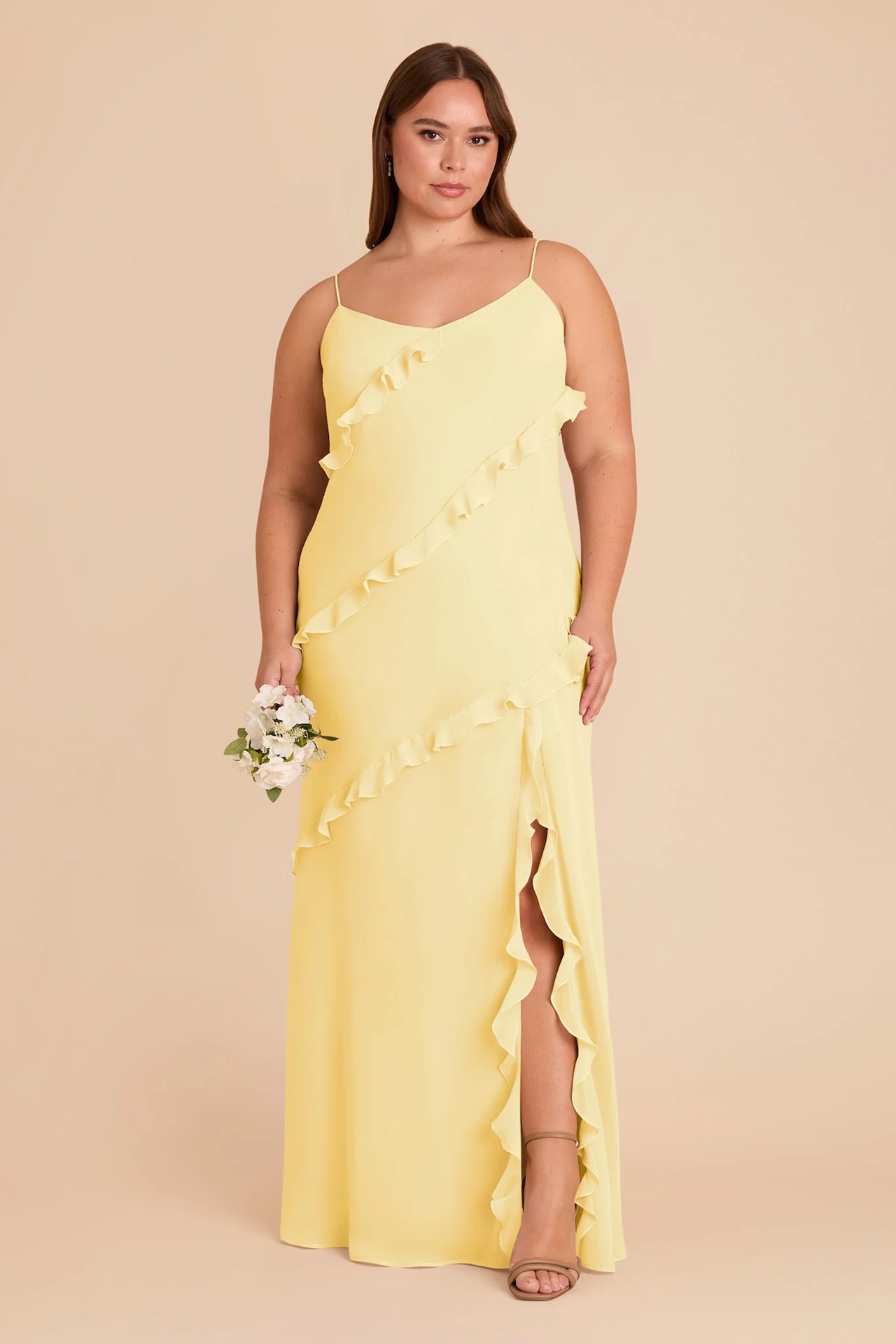 Model wearing butter yellow bridesmaid dress