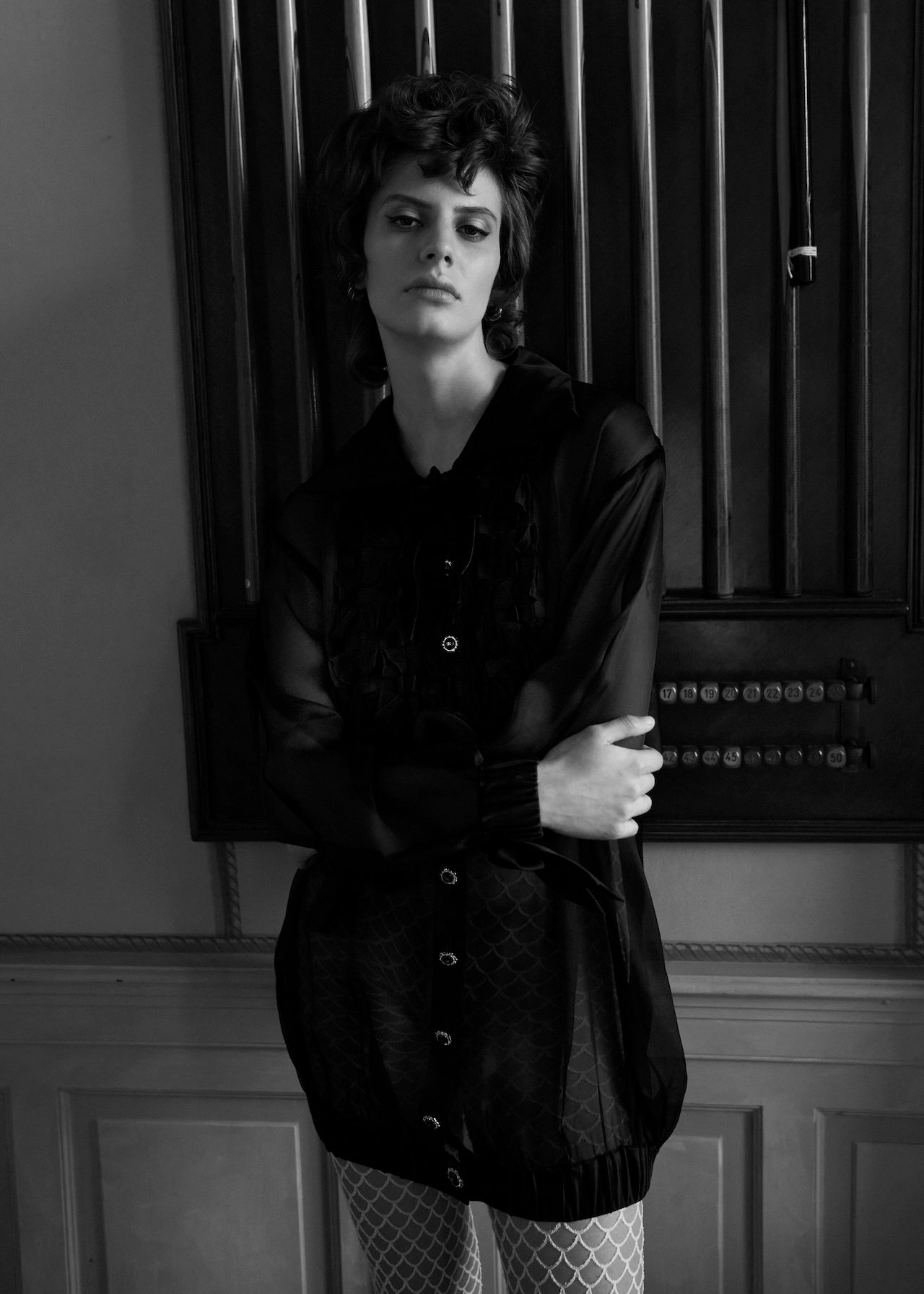 CHANEL dress, 800-550-0005; Aurélie Bidermann earrings, bracelets, aureliebidermann.com; Wolford tights, wolford.com.