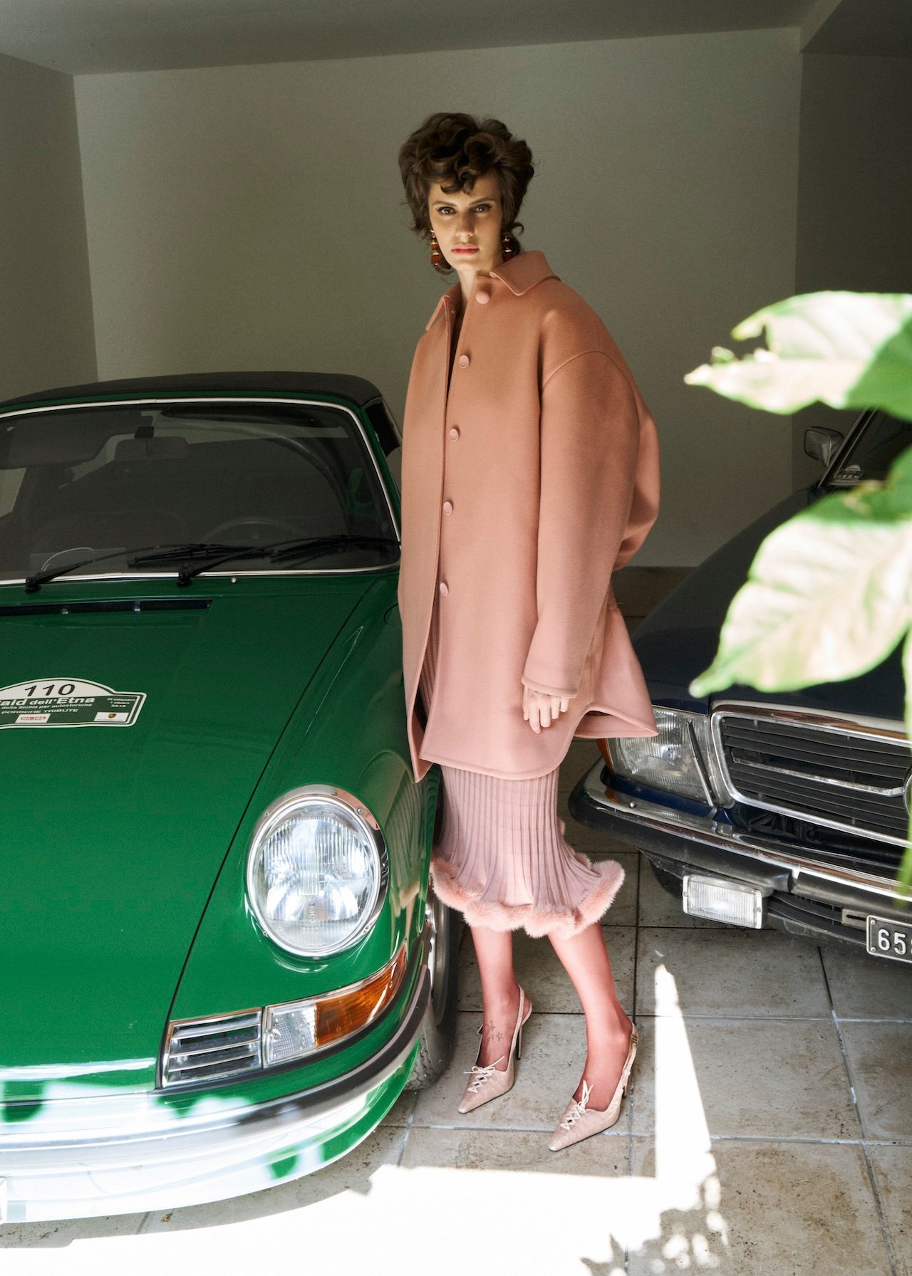 Fendi coat, skirt, fendi.com; Sodini earrings, sodini.com; Pierre Mantoux tights, pierremantoux.com; Aniye Records shoes, aniyerecords.com.