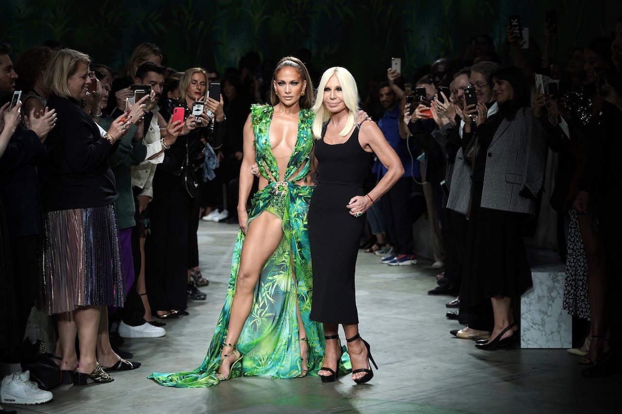 Jennifer Lopez and Donatella Versace walk the runway at the Versace show during the Milan Fashion Week Spring/Summer 2020