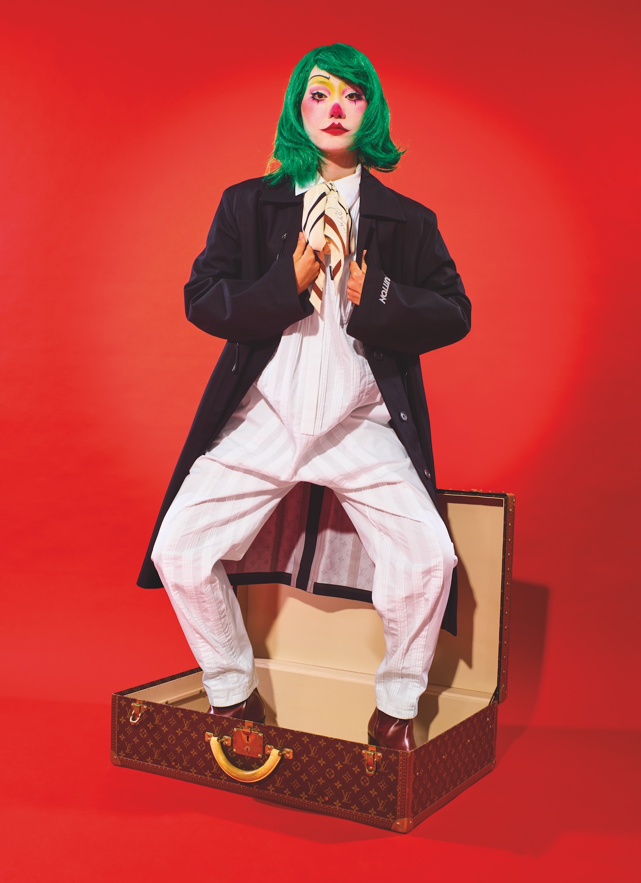 Louis Vuitton coat, jumpsuit, tie, boots, trunk, (866) VUITTON.