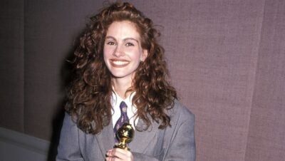 Julia Roberts attends the 47th Annual Golden Globe Awards in Armani suit