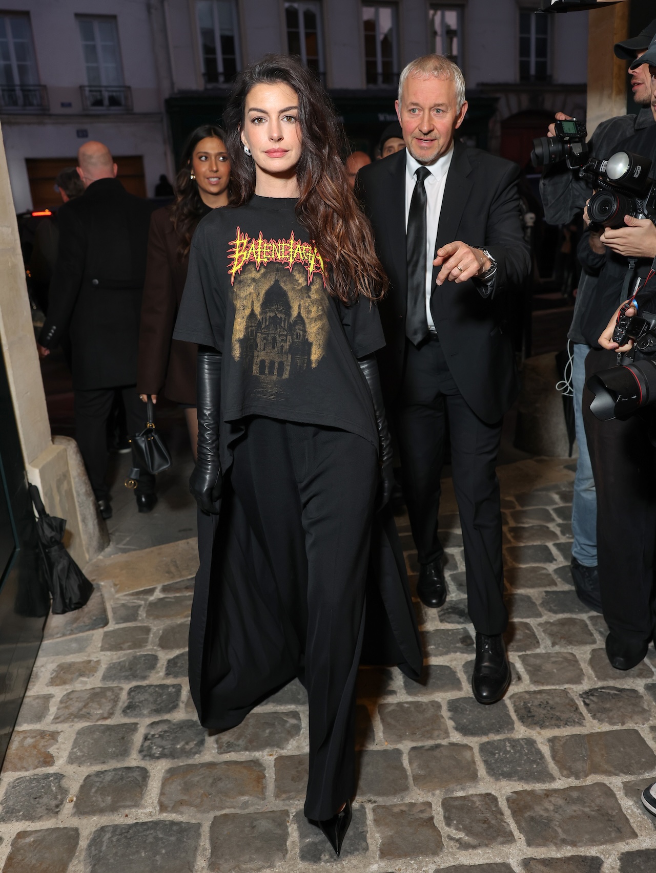 Anne Hathaway attends the Balenciaga Womenswear Spring/Summer 2026 show at Paris Fashion Week