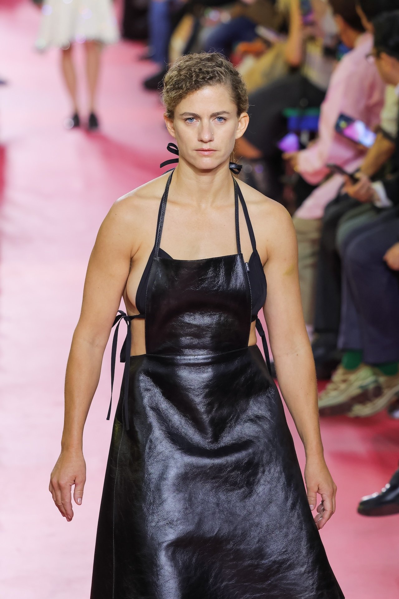 Miu Miu apron featured on the runway during PFW SS26
