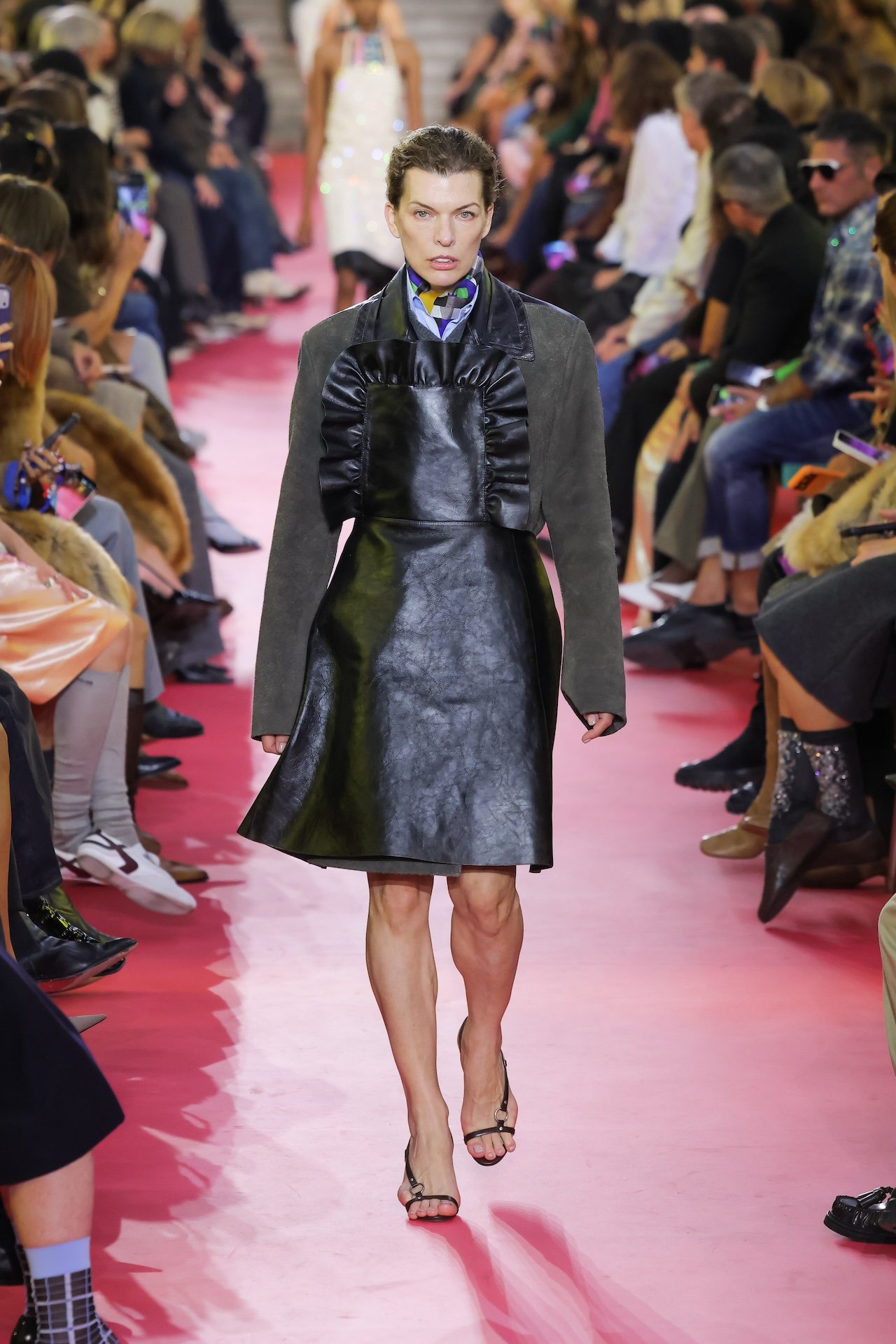 Miu Miu apron featured on the runway during PFW SS26