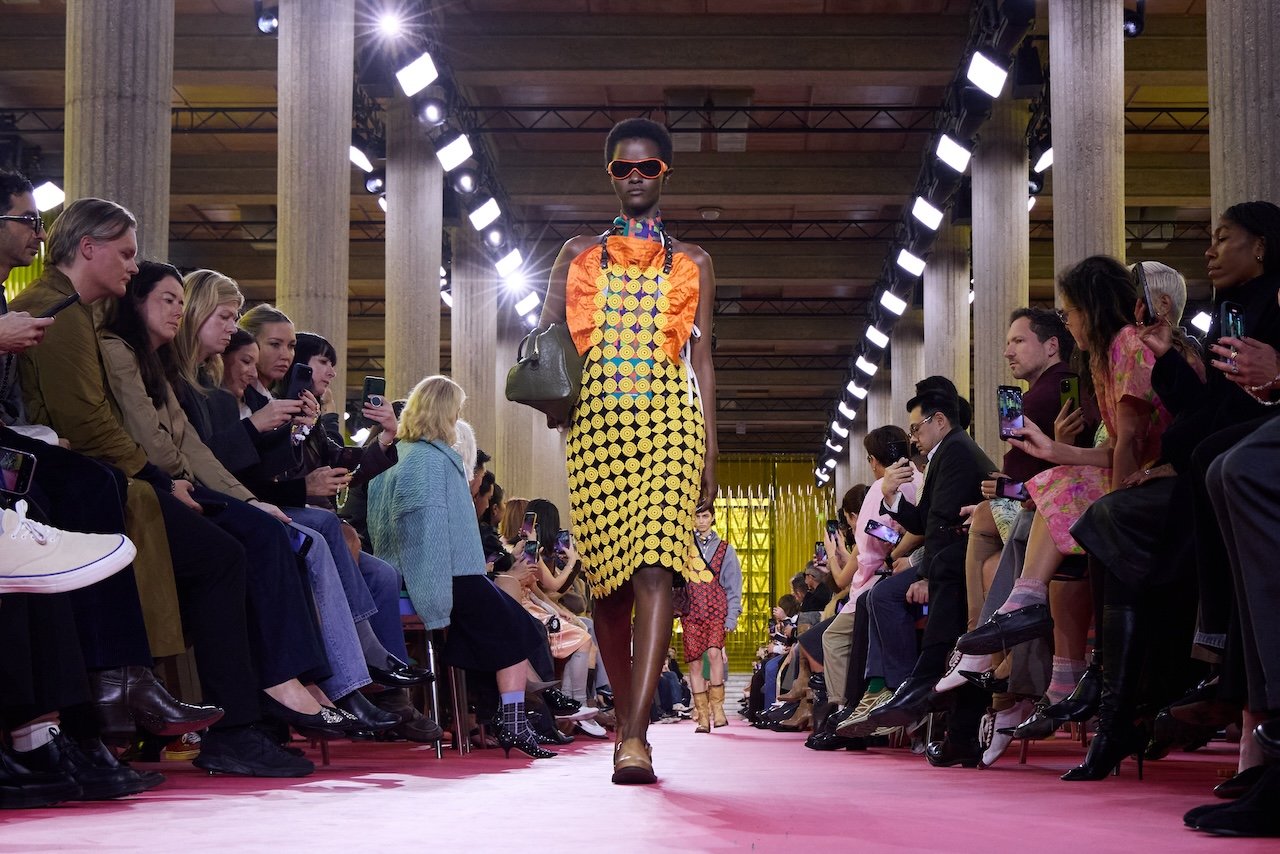 Miu Miu apron featured on the runway during PFW SS26