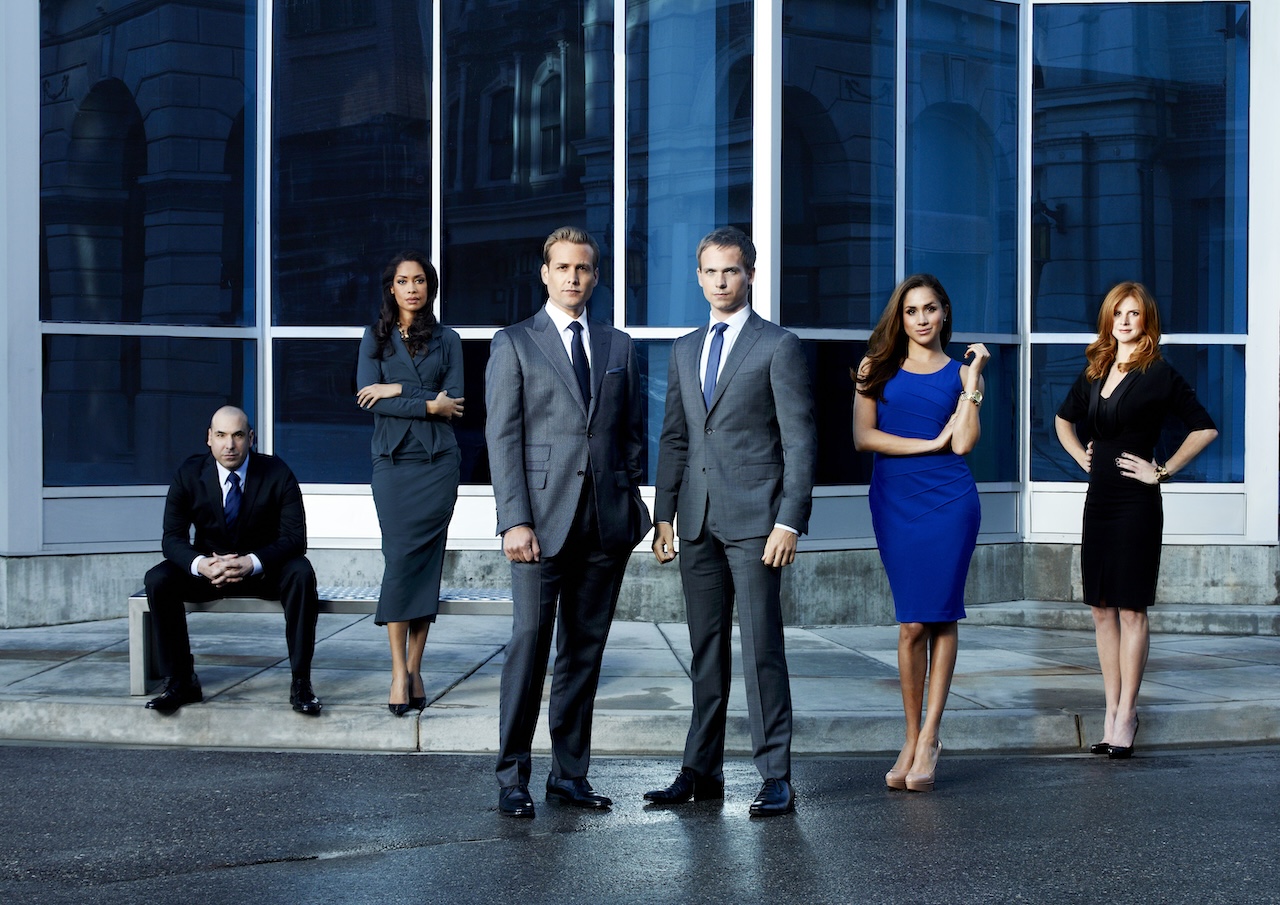 SUITS Season: 2 - Pictured: (l-r) Rick Hoffman as Louis Litt, Gina Torres as Jessica Pearson, Gabriel Macht as Harvey Specter, Patrick J. Adams as Mike Ross, Meghan Markle as Rachel Zane, Sarah Rafferty as Donna
