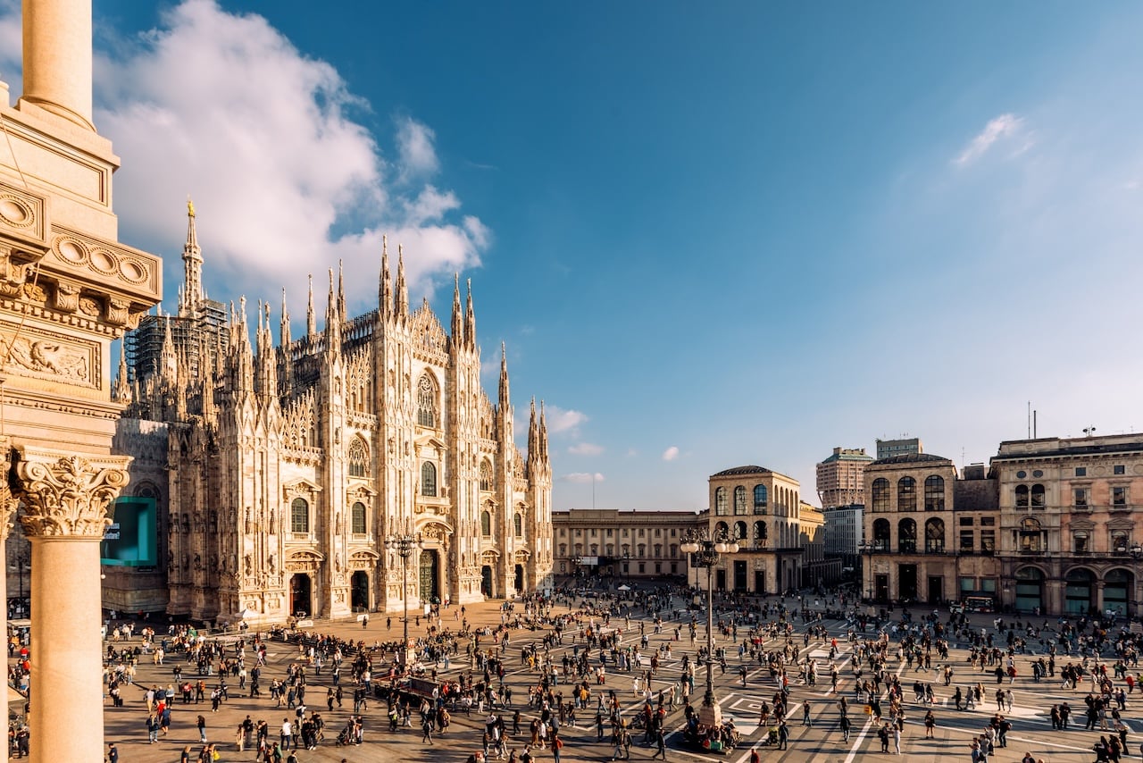 Duomo di Milano cathedral and Piazza del Duomo square on a sunny day, aerial view, Milan, Italy (Photo via Getty Images)