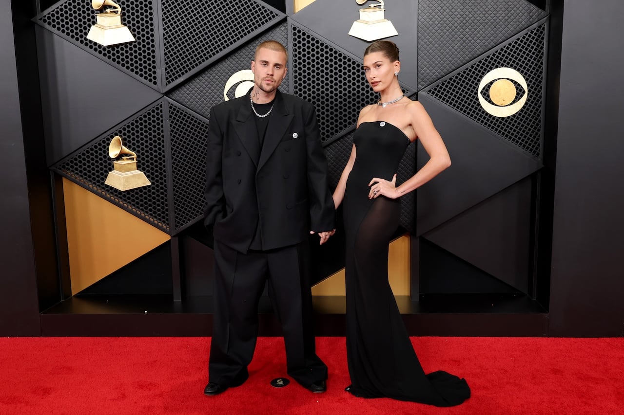LOS ANGELES, CALIFORNIA - FEBRUARY 01: (L-R) Justin Bieber and Hailey Bieber attend the 68th GRAMMY Awards at Crypto.com Arena on February 01, 2026 in Los Angeles, California. (Photo by Amy Sussman/Getty Images)
