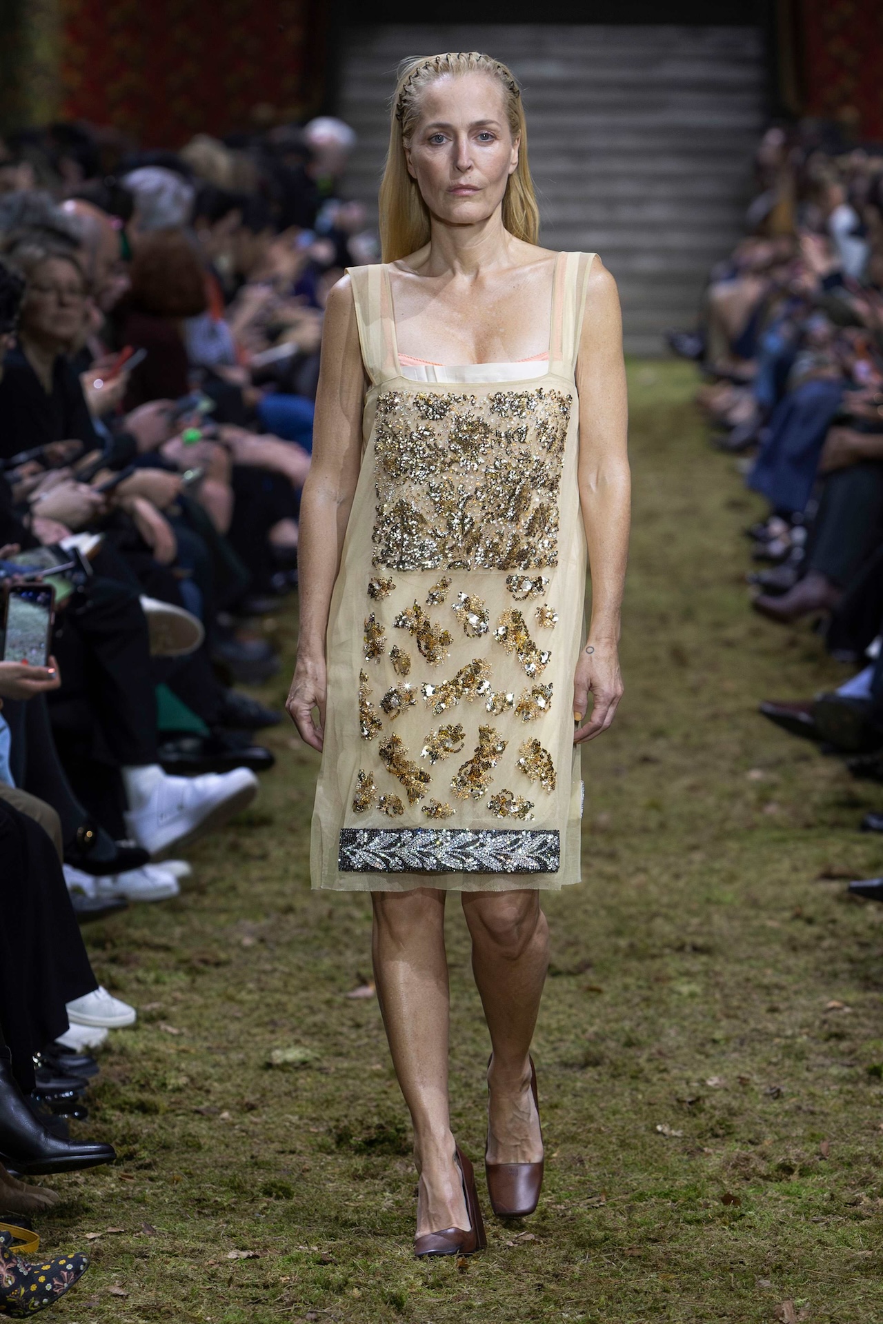 Gillian Anderson walking in the Miu Miu Fall/Winter 2026 runway show at Paris Fashion Week; Photo courtesy of Miu Miu