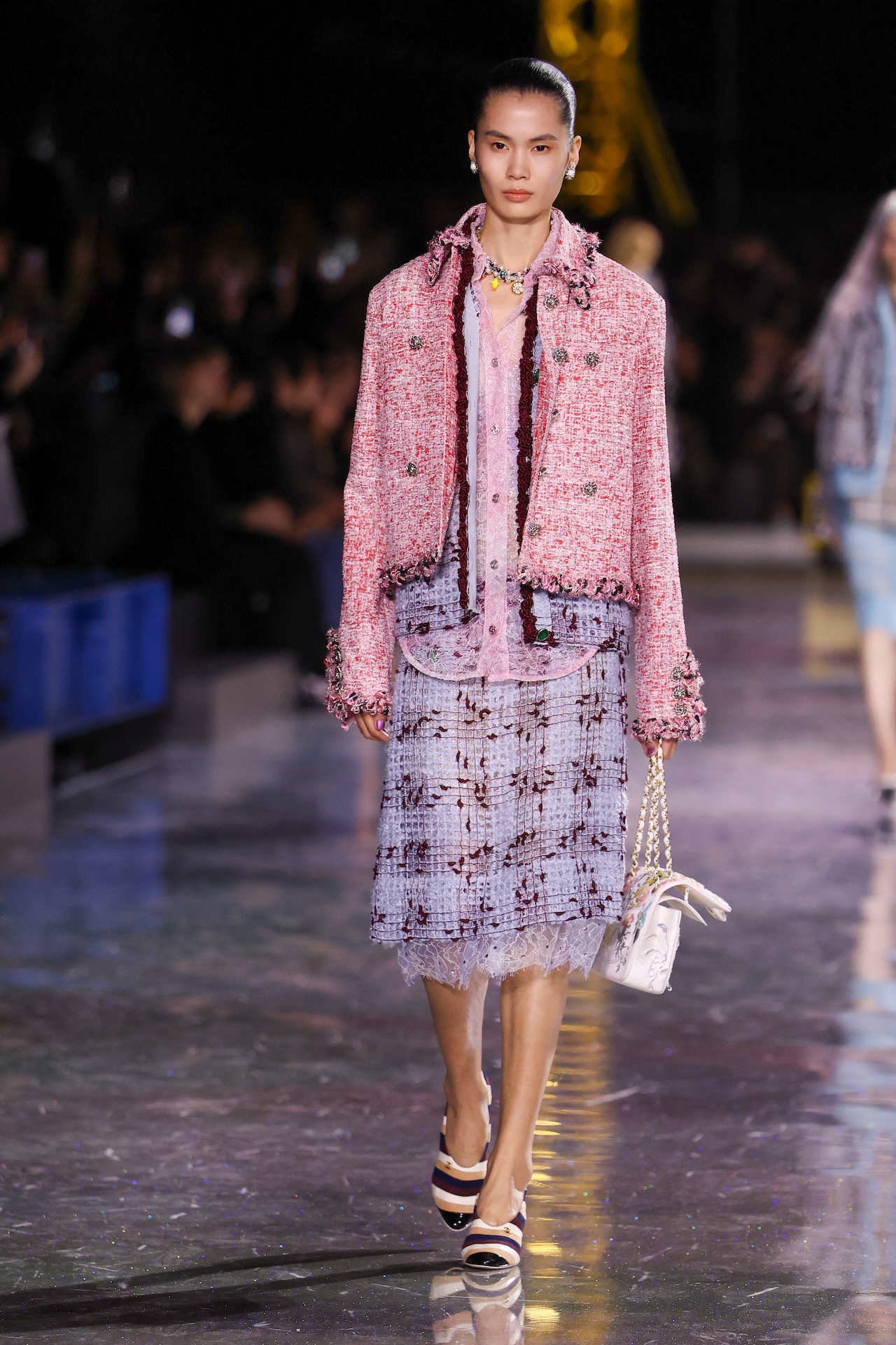 PARIS, FRANCE - MARCH 09: (EDITORIAL USE ONLY - For Non-Editorial use please seek approval from Fashion House) A model walks the runway during the Chanel Womenswear Fall/Winter 2026-2027 show as part of Paris Fashion Week on March 09, 2026 in Paris, France. (Photo by Stephane Cardinale - Corbis/Corbis via Getty Images)
